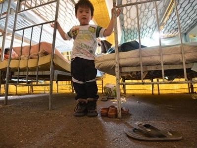 В лагере мигрантов. Фото РИА "Новости" В лагере мигрантов. Фото РИА "Новости"